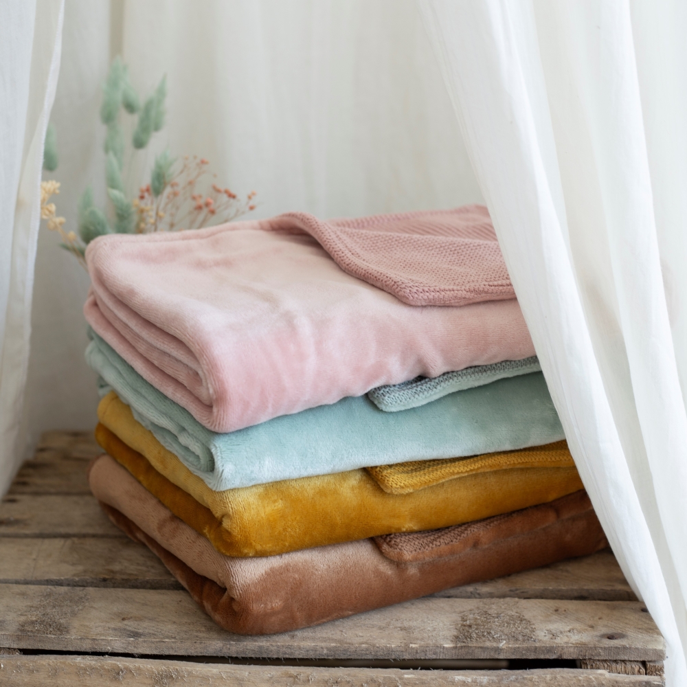 Mise en scène avec l'ensemble des couvertures colorées