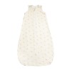 Off-white baby sleeping bag with leaf pattern