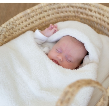Baby sleeping warmly in its soft sherpa sleeping bag Baby sleeping warmly in its soft sherpa sleeping bag