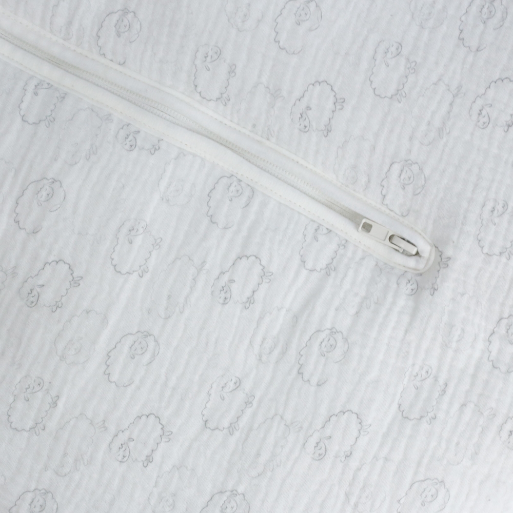 Zoom materia saco de dormir bebé blanco