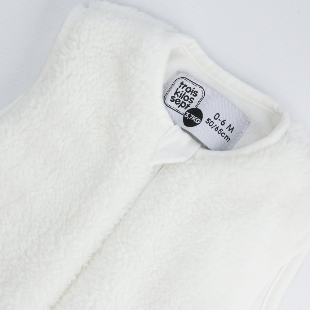 Baby white sleeping bag neckline Baby white sleeping bag neckline