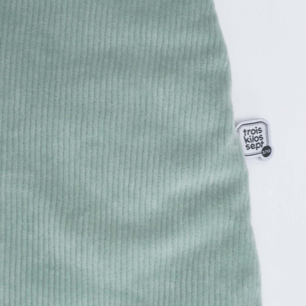 Close-up of corduroy fabric for 0-6 month baby sleeping bag Close-up of corduroy fabric for 0-6 month baby sleeping bag