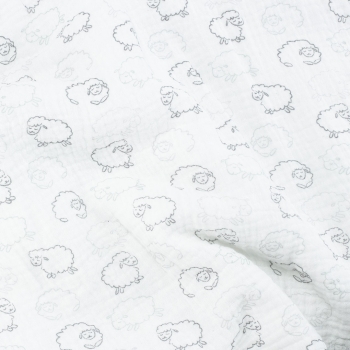 Zoom matière et motifs sur couverture blanche bébé Zoom matière et motifs sur couverture blanche bébé