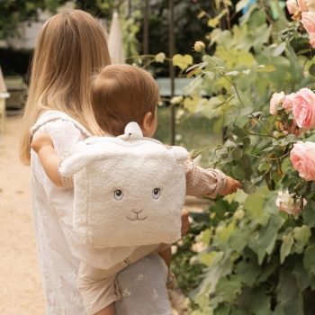 baby in mom's arms with backpack baby in mom's arms with backpack