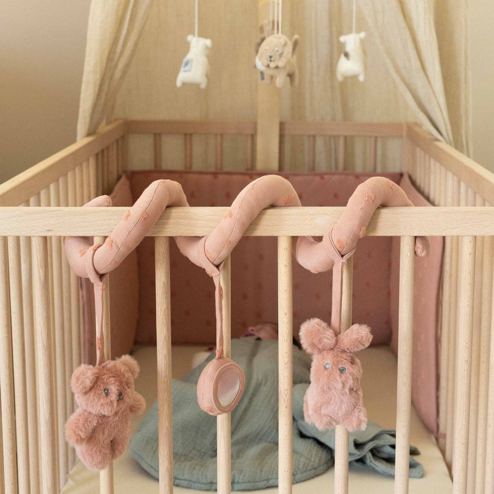 baby activity spiral attached to baby crib bars baby activity spiral attached to baby crib bars