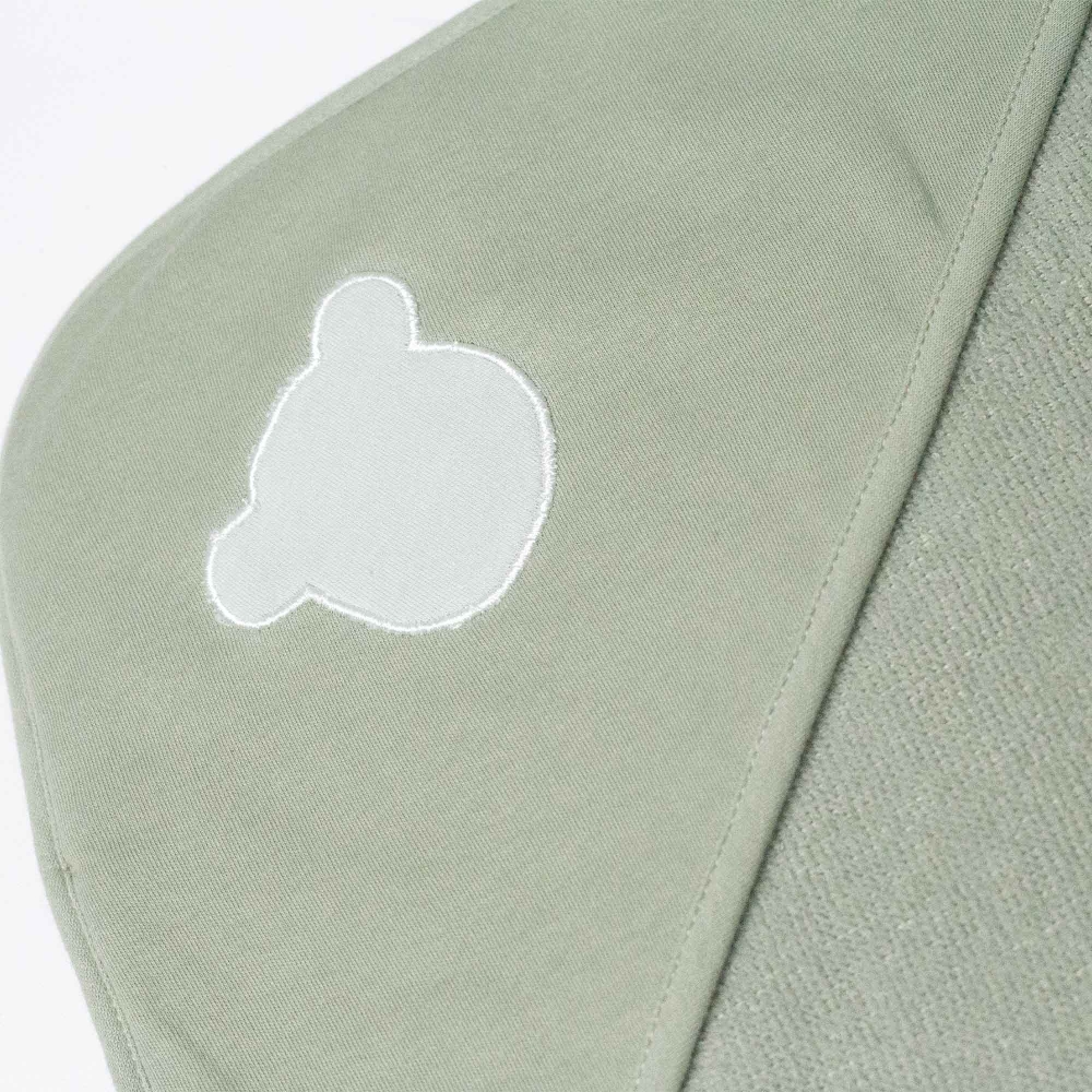 Close-up of olive green hooded bath towel hood Close-up of olive green hooded bath towel hood