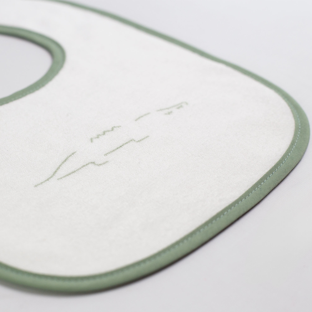 close-up of beige baby bib material