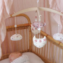 musical mobile above a sleeping baby in his crib musical mobile above a sleeping baby in his crib