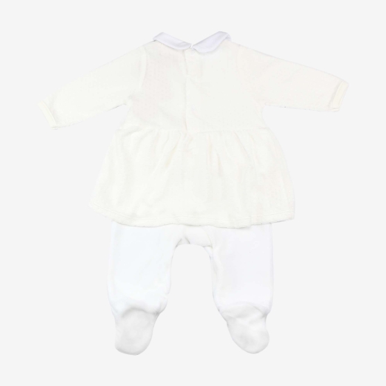 Baby sleeping in white Sophie the Giraffe pajama dress