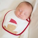 Babete de Natal com boneco de gengibre Babete de Natal com boneco de gengibre