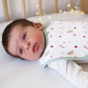 Bebé acordado no seu primeiro Natal Bebé acordado no seu primeiro Natal