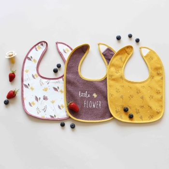 Floral bib staging with summer fruits Floral bib staging with summer fruits