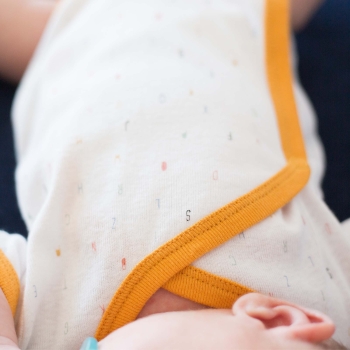 Close-up of the alphabet sleeveless bodysuit