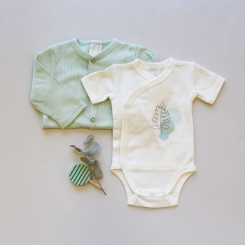 Staging of the ecru bodysuit with a sage corduroy pajama Staging of the ecru bodysuit with a sage corduroy pajama