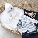Lookbook met het wit en marineblauw mutsje Lookbook met het wit en marineblauw mutsje