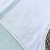 Pormenor do bordado de baleia verde-leite no saco de dormir para recém-nascido Au large de Nova Pormenor do bordado de baleia verde-leite no saco de dormir para recém-nascido Au large de Nova