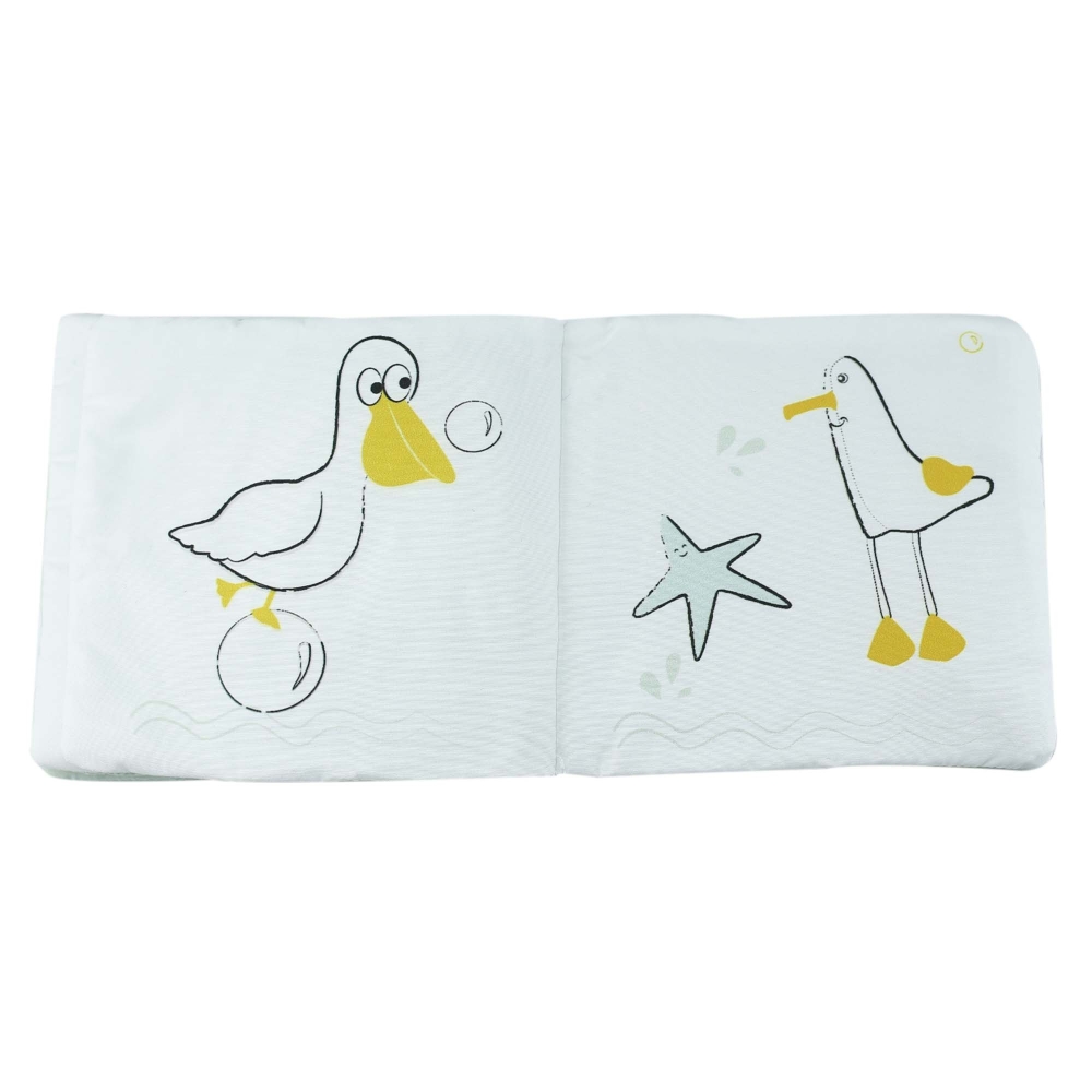 open baby book with seagull, star and gull open baby book with seagull, star and gull