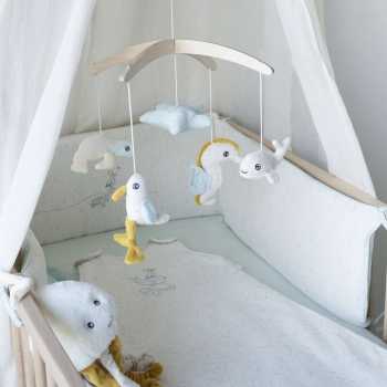peluche musical Ao largo de Nova na cama peluche musical Ao largo de Nova na cama
