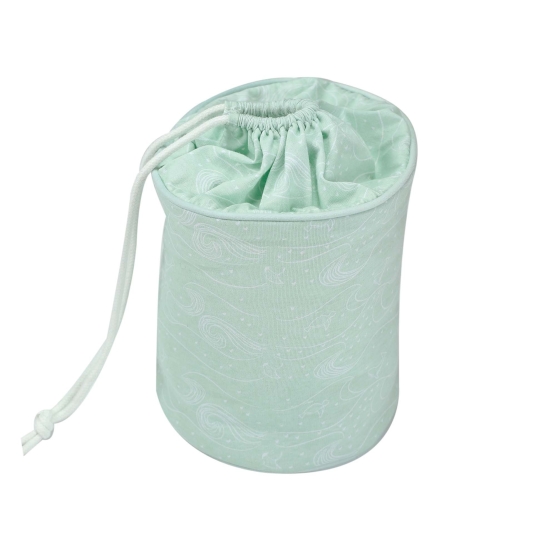 product photo of a nomadic storage basket in milky green with ocean patterns