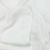 close-up of the 100% cotton terry fabric of the mini soft baby bath cape close-up of the 100% cotton terry fabric of the mini soft baby bath cape