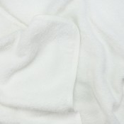 zoom sur le tissus éponge 100% coton de la cape de bain mini nous tout dous zoom sur le tissus éponge 100% coton de la cape de bain mini nous tout dous