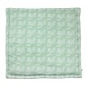 playpen mat with a white leaf pattern on a sage green background