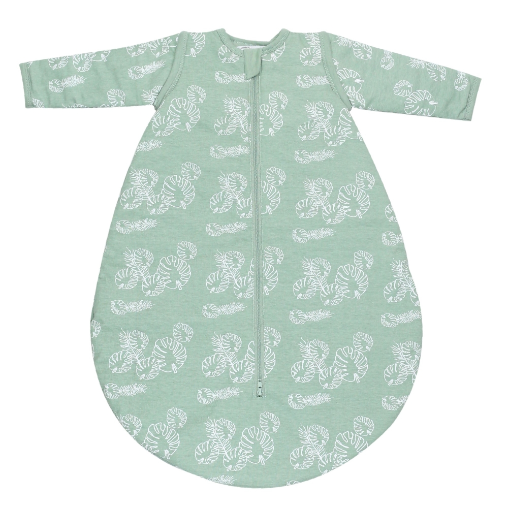 saco de dormir verde salvia y sus motivos de hojas tropicales