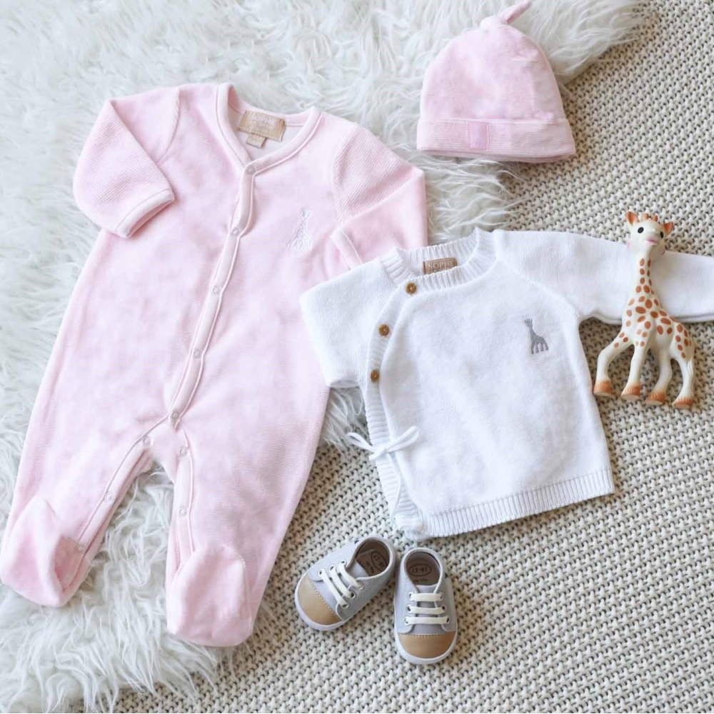 Pale pink ©Sophie la girafe crop top matching a pink velvet pajama and hat