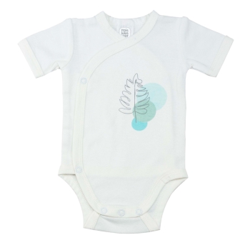 Close-up of the white bodysuit with a heart motif Close-up of the white bodysuit with a heart motif