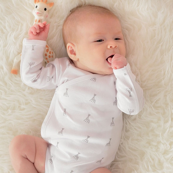 Sophie the Giraffe patterned wrap-around bodysuit, front view