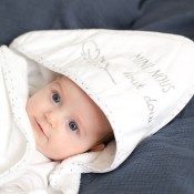 baby in its mini us hooded bath towel