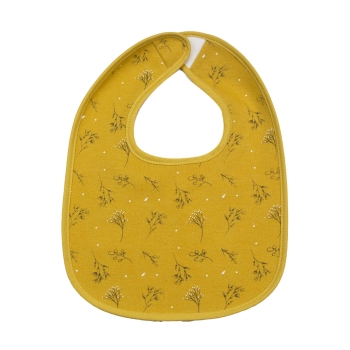 Magnífico babero mostaza con estampado floral all-over