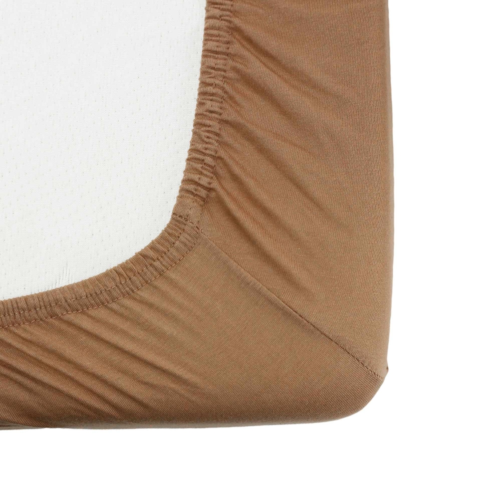 Zoom sur l'élastique du drap housse camel Zoom sur l'élastique du drap housse camel
