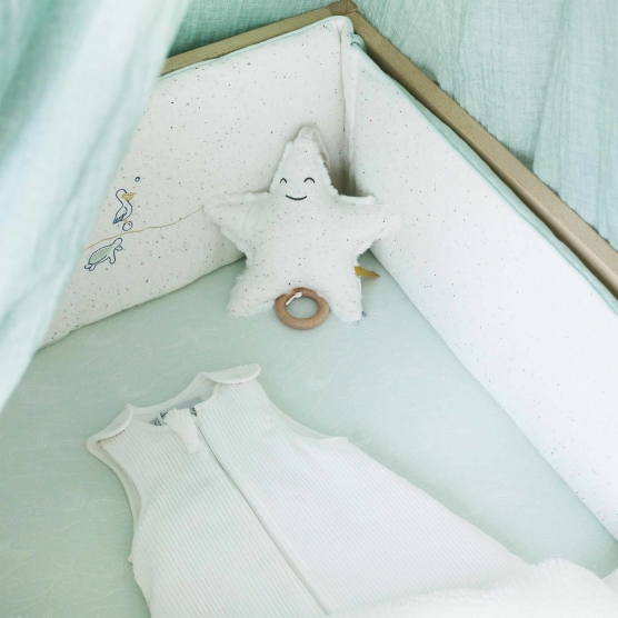 Front view of the newborn sleeping bag, white in corduroy
